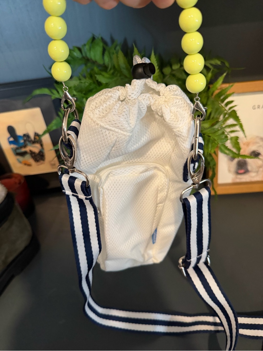 White Drawstring Crossbody Bag with Navy Stripe Strap